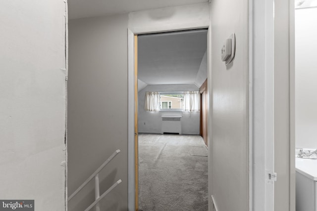 9 Queens Bridge Rd, Levittown, PA 19057 - corridor featuring radiator heating unit and carpet floors