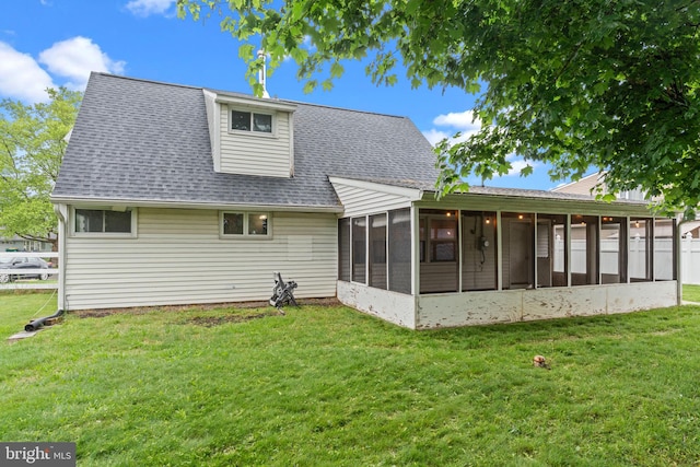 9 Queens Bridge Rd, Levittown, PA 19057 - back of property featuring a sunroom and roof with shingles