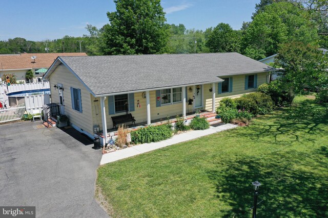 117 Mimosa Dr, Cambridge, MD 21613 - ranch-style home featuring covered porch, a shingled roof, and driveway