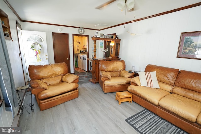 117 Mimosa Dr, Cambridge, MD 21613 - living area featuring light wood-type flooring, ornamental molding, a ceiling fan, and washer / dryer