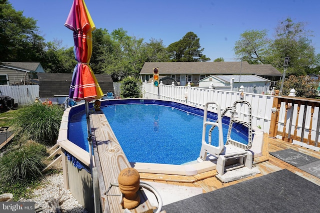 117 Mimosa Dr, Cambridge, MD 21613 - view of swimming pool with a fenced backyard and a wooden deck