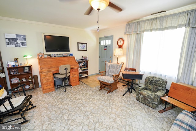 117 Mimosa Dr, Cambridge, MD 21613 - living area featuring crown molding, a desk, light stone finish floors, and ceiling fan