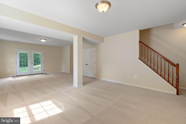 2024 Baythorne Rd, Prince Frederick, MD 20678 - basement featuring light colored carpet, stairs, baseboards, and french doors