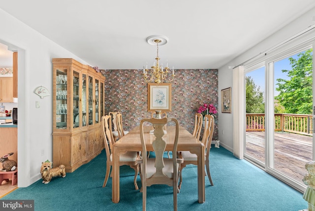 3135 Windon Ave, Lancaster, PA 17603 - carpeted dining room featuring a chandelier, wallpapered walls, and baseboards
