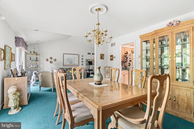 3135 Windon Ave, Lancaster, PA 17603 - carpeted dining room with a chandelier and vaulted ceiling