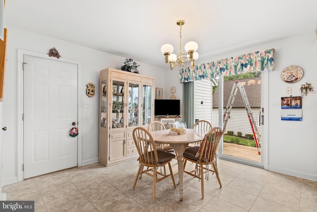 3135 Windon Ave, Lancaster, PA 17603 - dining room featuring a chandelier, baseboards, and light tile patterned floors