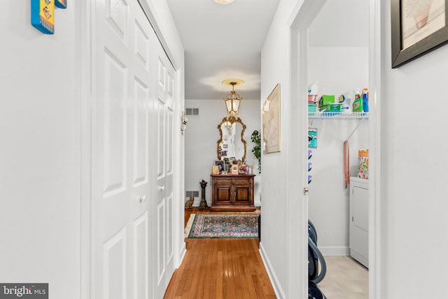 3135 Windon Ave, Lancaster, PA 17603 - hallway featuring washer / clothes dryer and light wood-type flooring