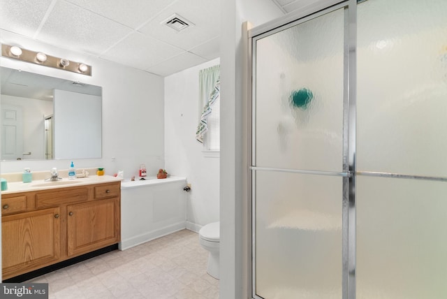 3135 Windon Ave, Lancaster, PA 17603 - bathroom featuring a drop ceiling, a shower stall, vanity, toilet, and tile patterned floors