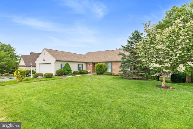 3135 Windon Ave, Lancaster, PA 17603 - ranch-style home featuring a garage, a front yard, and a shingled roof