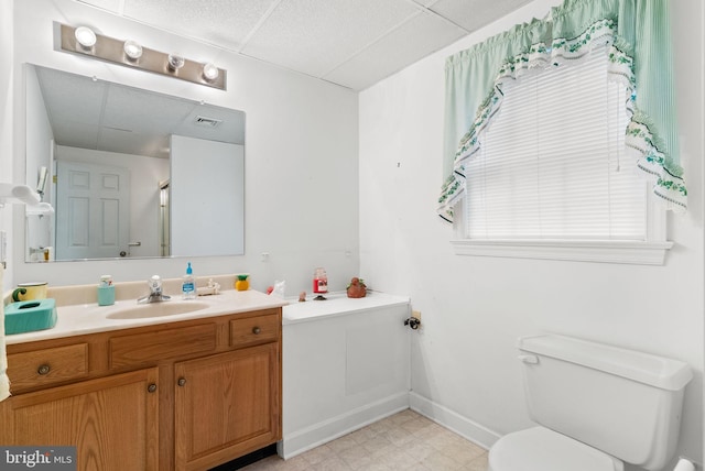 3135 Windon Ave, Lancaster, PA 17603 - bathroom with toilet, a drop ceiling, vanity, and baseboards