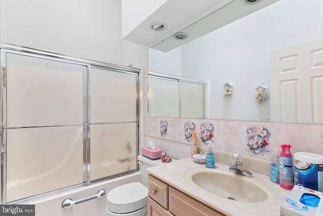 3135 Windon Ave, Lancaster, PA 17603 - bathroom featuring vanity, shower / bath combination with glass door, and toilet