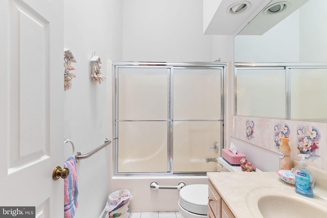3135 Windon Ave, Lancaster, PA 17603 - full bath with vanity, bath / shower combo with glass door, toilet, and tile patterned floors