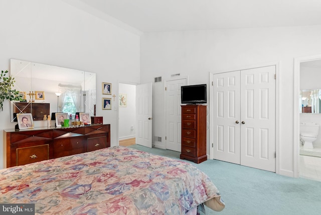 3135 Windon Ave, Lancaster, PA 17603 - carpeted bedroom featuring high vaulted ceiling, ensuite bath, and baseboards