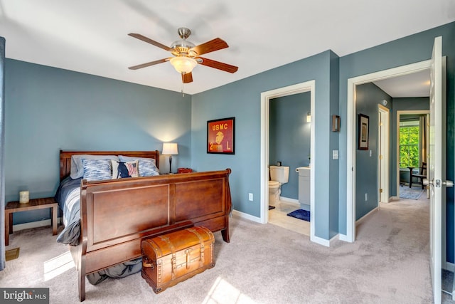 9568 Buttonbush Ct, Manassas, VA 20110 - bedroom with carpet floors, baseboards, connected bathroom, and a ceiling fan