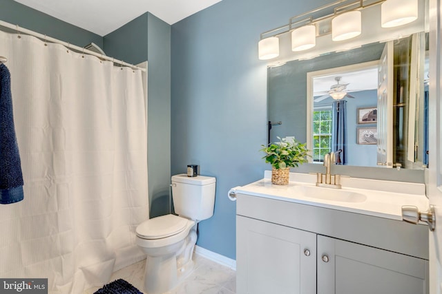 9568 Buttonbush Ct, Manassas, VA 20110 - bathroom featuring marble finish flooring, toilet, vanity, baseboards, and a ceiling fan