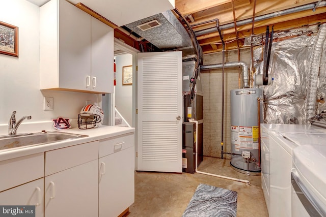 9568 Buttonbush Ct, Manassas, VA 20110 - utility room with gas water heater, washer and clothes dryer, and a sink