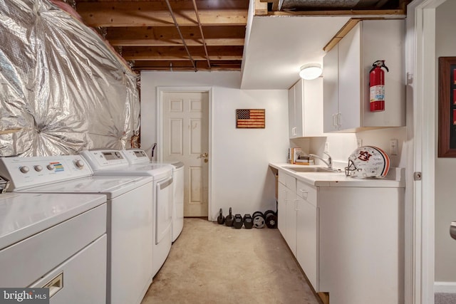 9568 Buttonbush Ct, Manassas, VA 20110 - laundry room with washing machine and clothes dryer and cabinet space