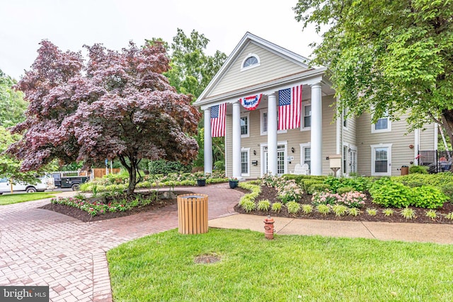 9568 Buttonbush Ct, Manassas, VA 20110 - greek revival house featuring a front lawn