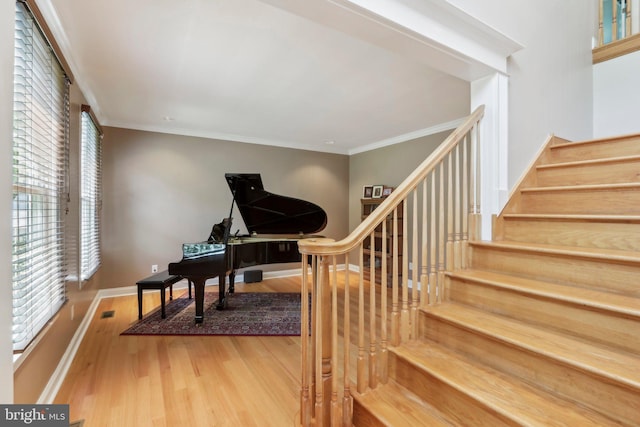 1311 Meadowbrook Ct, Jenkintown, PA 19046 - stairs with wood finished floors, ornamental molding, and baseboards