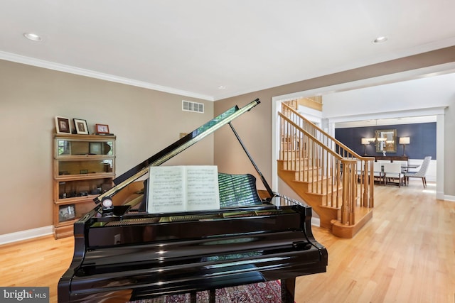 1311 Meadowbrook Ct, Jenkintown, PA 19046 - living area with wood finished floors, stairs, a chandelier, ornamental molding, and baseboards