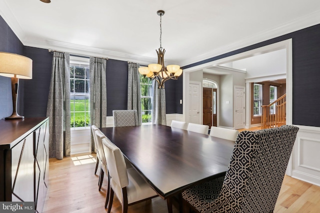 1311 Meadowbrook Ct, Jenkintown, PA 19046 - dining area with a chandelier, light wood finished floors, ornamental molding, stairway, and a wainscoted wall