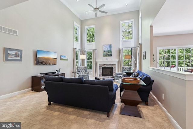 1311 Meadowbrook Ct, Jenkintown, PA 19046 - carpeted living area featuring baseboards, a ceiling fan, a towering ceiling, healthy amount of natural light, and a fireplace