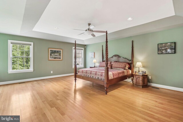 1311 Meadowbrook Ct, Jenkintown, PA 19046 - bedroom featuring a tray ceiling, light wood-type flooring, baseboards, ceiling fan, and recessed lighting