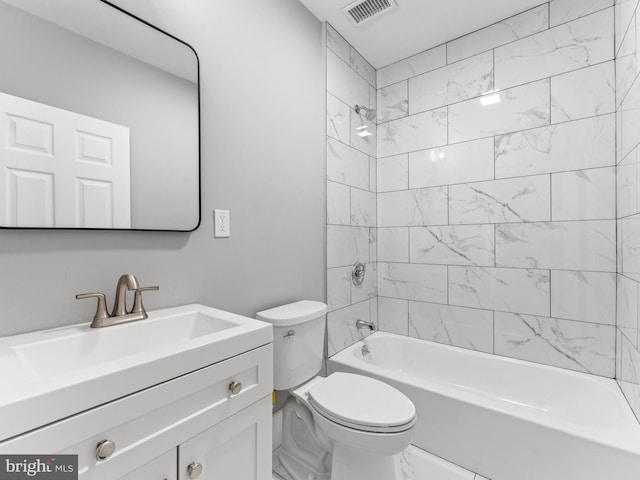 full bath featuring toilet, vanity,  shower combination, and marble finish floors