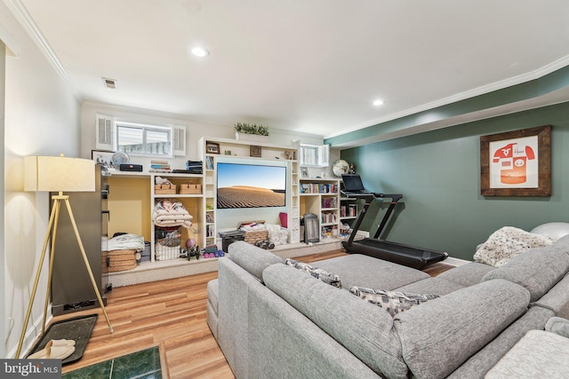 living room with crown molding, wood finished floors, and recessed lighting
