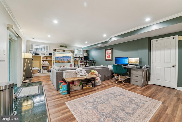 bedroom featuring ornamental molding, an office area, recessed lighting, and wood finished floors