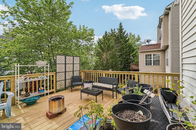 deck featuring an outdoor living space