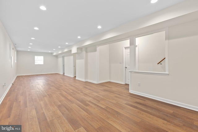 910 Ficklen Rd, Fredericksburg, VA 22405 - basement featuring wood finished floors, recessed lighting, baseboards, and stairs
