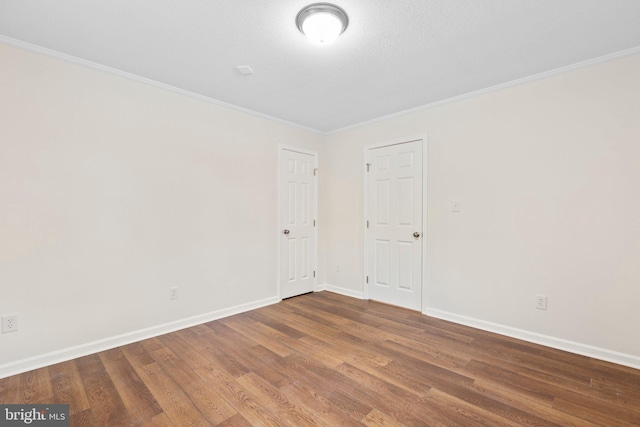 910 Ficklen Rd, Fredericksburg, VA 22405 - empty room with ornamental molding, wood finished floors, and baseboards