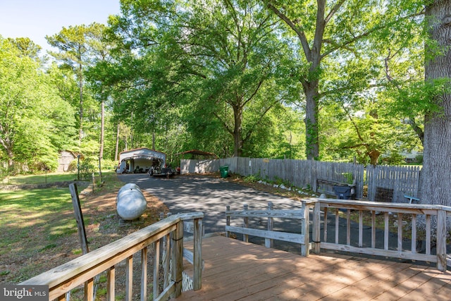 910 Ficklen Rd, Fredericksburg, VA 22405 - wooden deck with a detached carport and fence