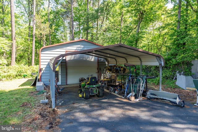 910 Ficklen Rd, Fredericksburg, VA 22405 - view of outbuilding featuring a detached carport and asphalt driveway