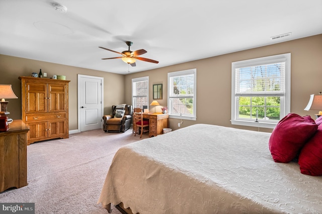 211 Dutton Mill Rd, West Chester, PA 19380 - carpeted bedroom featuring multiple windows and ceiling fan