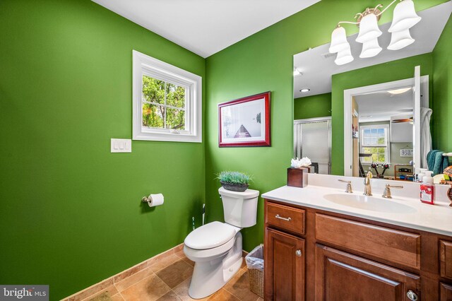 211 Dutton Mill Rd, West Chester, PA 19380 - full bath featuring toilet, vanity, a stall shower, and baseboards