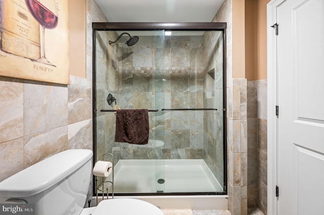 211 Dutton Mill Rd, West Chester, PA 19380 - full bathroom featuring tile walls, toilet, and a stall shower
