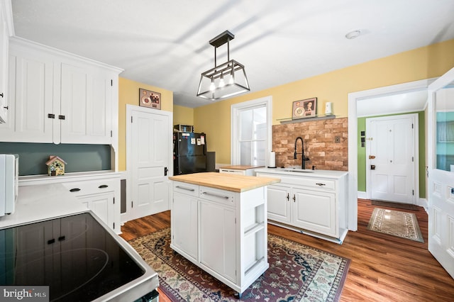 211 Dutton Mill Rd, West Chester, PA 19380 - kitchen featuring wood counters, freestanding refrigerator, a sink, white cabinets, and open shelves