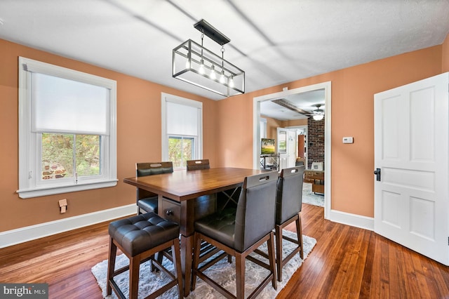 211 Dutton Mill Rd, West Chester, PA 19380 - dining space with baseboards, wood finished floors, and ceiling fan