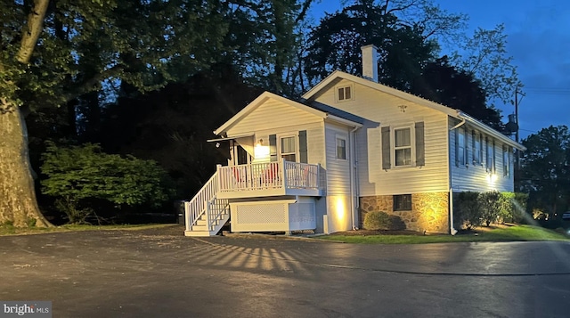 211 Dutton Mill Rd, West Chester, PA 19380 - view of front of home featuring stairway, driveway, stone siding, and a porch