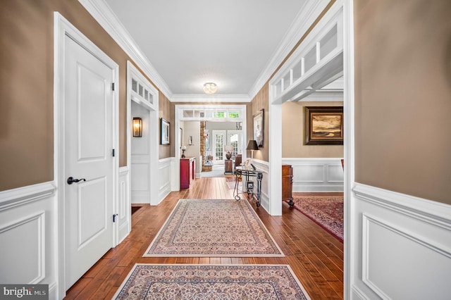 211 Dutton Mill Rd, West Chester, PA 19380 - hallway with wood-type flooring, wainscoting, crown molding, and a decorative wall