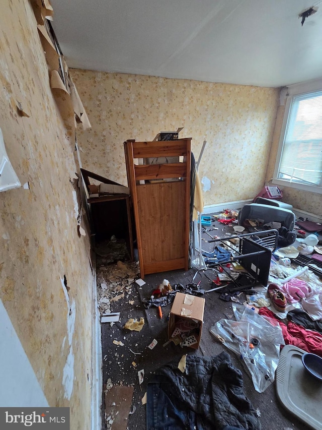 miscellaneous room with wallpapered walls