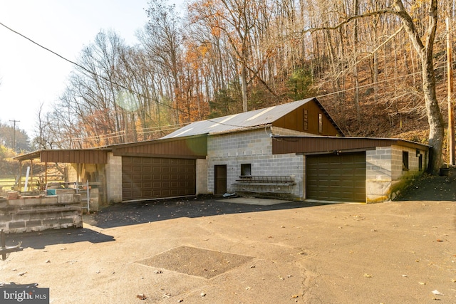 garage featuring driveway