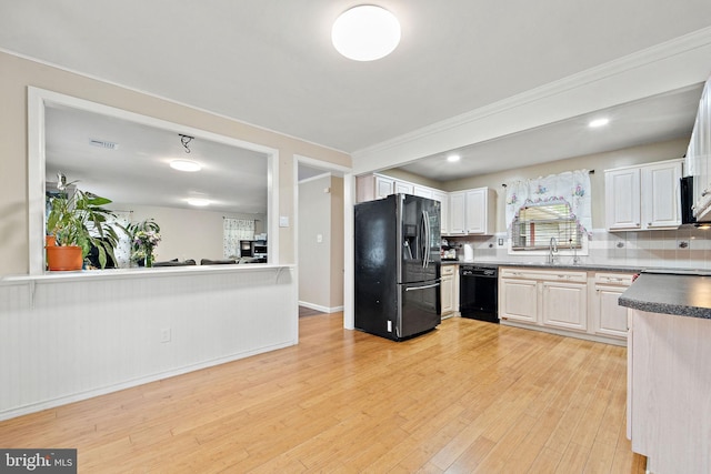 90 Echohill Ln, Willingboro, NJ 08046 - kitchen with black appliances, a sink, light wood-style floors, backsplash, and crown molding