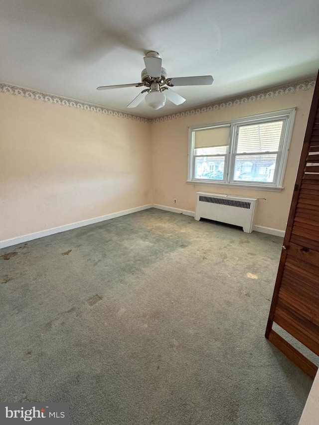 2939 Tyson Ave, Philadelphia, PA 19149 - carpeted spare room with radiator heating unit, baseboards, and a ceiling fan