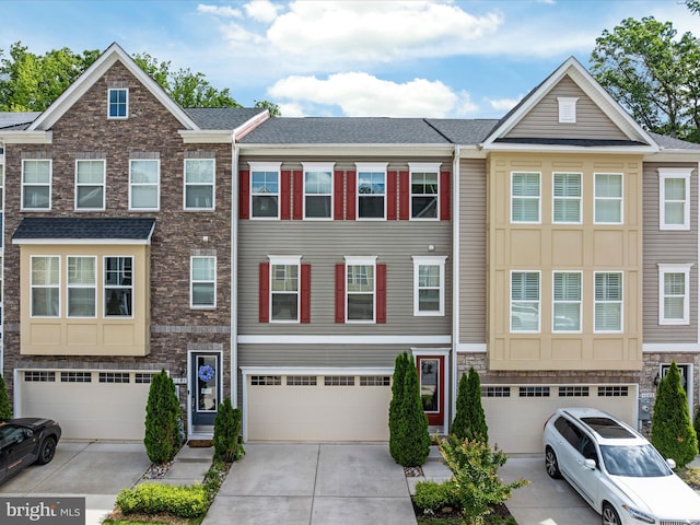 1205 Hickory Hill Cir, Arnold, MD 21012 - view of property with an attached garage and driveway