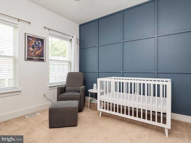 1205 Hickory Hill Cir, Arnold, MD 21012 - carpeted bedroom with a crib and baseboards