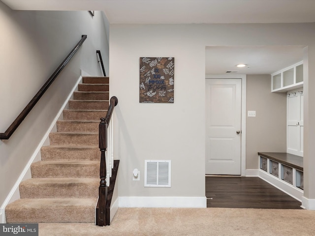 1205 Hickory Hill Cir, Arnold, MD 21012 - staircase featuring baseboards, wood finished floors, recessed lighting, and carpet