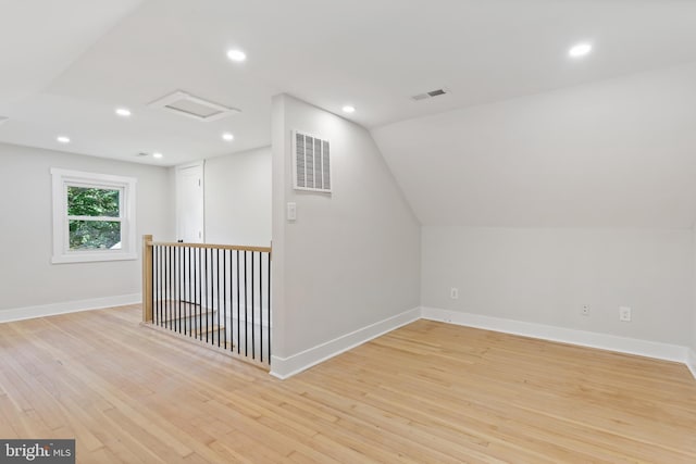3 Knox Pl, Silver Spring, MD 20901 - bonus room with attic access, light wood-style flooring, recessed lighting, and vaulted ceiling